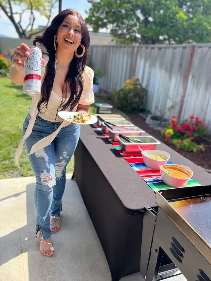 an image of a latina woman with tacos